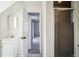 Bathroom with shower, vanity, and access to bedroom at 5325 Charlin Ave, Lakeland, FL 33810