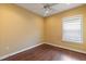 Spacious bedroom with hardwood floors and large window at 5508 Pebble Beach Dr, Lakeland, FL 33812