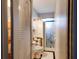 Small bathroom with shower and toilet at 6085 Amaryllis Dr, Indian Lake Estates, FL 33855