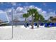 Community beach area with lounge chairs and volleyball at 606 Gran Bahama Boulevard # 29-606, Davenport, FL 33897