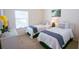 Two twin beds in bright bedroom with white wicker furniture at 606 Gran Bahama Boulevard # 29-606, Davenport, FL 33897