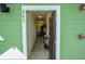 Open door revealing the interior entryway and hallway at 606 Gran Bahama Boulevard # 29-606, Davenport, FL 33897