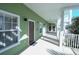 Building hallway with green walls and brown doors at 606 Gran Bahama Boulevard # 29-606, Davenport, FL 33897