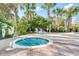Community hot tub with lounge chairs nearby at 606 Gran Bahama Boulevard # 29-606, Davenport, FL 33897