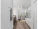 Clean bathroom with double vanity and walk-in shower at 840 S Palm Ave, Frostproof, FL 33843