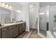 Double vanity bathroom with large shower and garden tub at 840 S Palm Ave, Frostproof, FL 33843