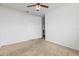 Spacious bedroom with ceiling fan and closet at 840 S Palm Ave, Frostproof, FL 33843