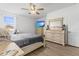 Bright bedroom featuring a large bed and ample storage at 840 S Palm Ave, Frostproof, FL 33843