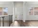 Modern entryway with wood-look floors and neutral color scheme at 840 S Palm Ave, Frostproof, FL 33843