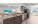 Updated kitchen with stainless steel appliances and ample counter space at 840 S Palm Ave, Frostproof, FL 33843