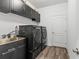 Laundry room with washer, dryer, and utility sink at 840 S Palm Ave, Frostproof, FL 33843
