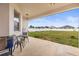 Covered patio with backyard view and grill at 840 S Palm Ave, Frostproof, FL 33843