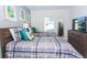 Bedroom with two twin beds and dresser at 1534 Carey Palm Cir, Kissimmee, FL 34747