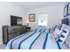 Bedroom with two twin beds and a dresser at 1534 Carey Palm Cir, Kissimmee, FL 34747
