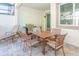 Outdoor patio with table, chairs, and grill at 1534 Carey Palm Cir, Kissimmee, FL 34747