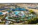 Aerial view of Windsor Island Resort showing the community pool, lazy river, and water slides at 1166 Aloha Blvd, Davenport, FL 33897