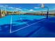 Outdoor community basketball court with blue surface and white lines at 1166 Aloha Blvd, Davenport, FL 33897