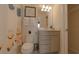 Clean bathroom with a shower/tub combo, vanity, and linen storage at 1166 Aloha Blvd, Davenport, FL 33897