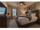 Cozy bedroom with a king-size bed and window view at 1166 Aloha Blvd, Davenport, FL 33897