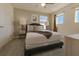 Spacious bedroom featuring a queen-size bed and plenty of natural light at 1166 Aloha Blvd, Davenport, FL 33897