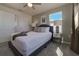 Bright bedroom with a double bed, nightstands, and ample natural light at 1166 Aloha Blvd, Davenport, FL 33897