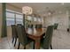 Elegant dining room with a large table and eight chairs at 1166 Aloha Blvd, Davenport, FL 33897