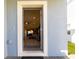 Open front door revealing the interior living space at 1166 Aloha Blvd, Davenport, FL 33897