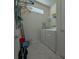Laundry room with washer, dryer, and storage at 1166 Aloha Blvd, Davenport, FL 33897