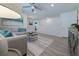 Spacious living room with hardwood floors and ceiling fan at 1166 Aloha Blvd, Davenport, FL 33897