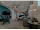 Open living room showcasing a comfortable seating area and views to dining area at 1166 Aloha Blvd, Davenport, FL 33897