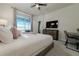 Main bedroom with king bed and view of the pool at 1166 Aloha Blvd, Davenport, FL 33897