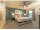 Bright main bedroom with a king-size bed and ensuite bathroom at 1166 Aloha Blvd, Davenport, FL 33897
