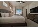 Main bedroom with king bed and access to the backyard pool at 1166 Aloha Blvd, Davenport, FL 33897