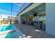 Covered patio with pool view and outdoor furniture at 1166 Aloha Blvd, Davenport, FL 33897