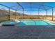 Refreshing screened pool and spa area at 1166 Aloha Blvd, Davenport, FL 33897