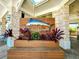 Elegant resort entrance with a large marlin sign and lush landscaping at 1166 Aloha Blvd, Davenport, FL 33897