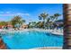 Stunning resort pool with waterslide and plenty of lounge chairs at 1166 Aloha Blvd, Davenport, FL 33897
