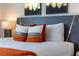 Main bedroom with plush bedding and modern decor at 9327 Sommerset Hills Dr, Davenport, FL 33896