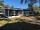 Home's back with screened patio at 2331 Olney Rd, Lakeland, FL 33801