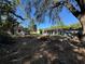 View of the home's backyard and neighboring property at 2331 Olney Rd, Lakeland, FL 33801
