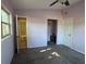 Bright bedroom with a view and access to a full bathroom at 2331 Olney Rd, Lakeland, FL 33801