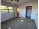 Spacious bedroom with light purple walls and carpeted floors at 2331 Olney Rd, Lakeland, FL 33801