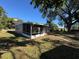 Ranch-style home with screened porch and large backyard at 2331 Olney Rd, Lakeland, FL 33801