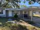Front entrance with carport and landscaping at 2331 Olney Rd, Lakeland, FL 33801