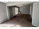 Living area with window and door access to outdoors at 2331 Olney Rd, Lakeland, FL 33801