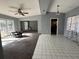 Open living area with tile and carpet at 2331 Olney Rd, Lakeland, FL 33801