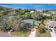 Bird's-eye view of a house near a lake, showcasing its location and surroundings at 151 Pine St, Babson Park, FL 33827