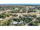 Wide aerial view of neighborhood with several homes at 151 Pine St, Babson Park, FL 33827