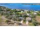 Community overview showing lakefront properties and lush greenery at 151 Pine St, Babson Park, FL 33827