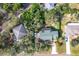 Aerial view of house and surrounding neighborhood at 151 Pine St, Babson Park, FL 33827